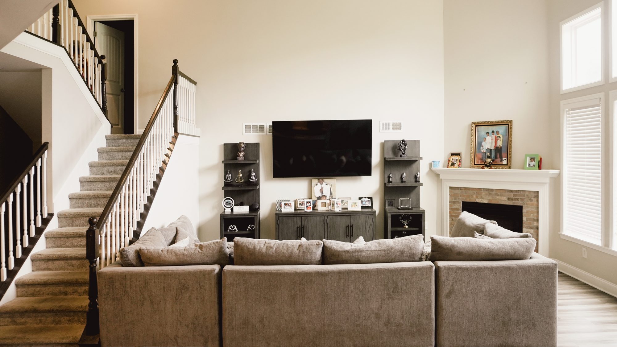 Living room as delivered: lifted blacks and a warm cast