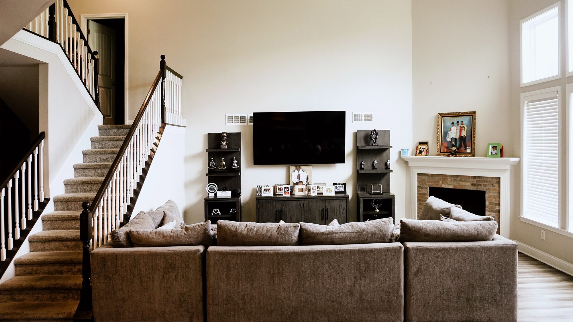 Living room after the edit: true blacks, neutral walls